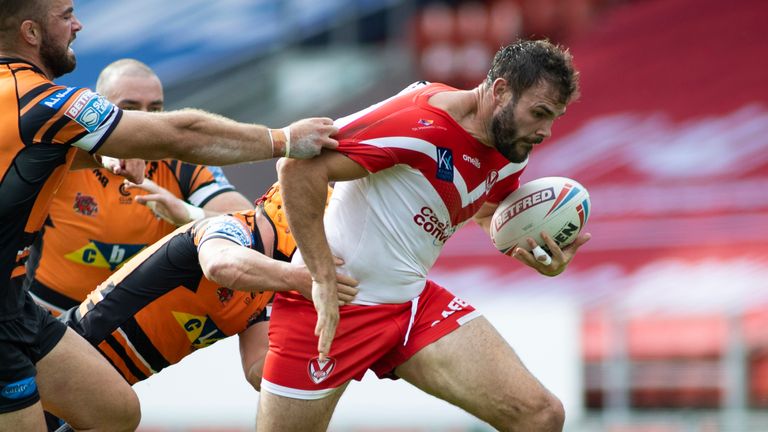 Picture by Isabel Pearce/SWpix.com - 16/08/2020 - Rugby League - Betfred Super League - St Helens v Castleford Tigers - The Totally Wicked Stadium, Langtree Park, St Helens, England - Alex Walmsley of St Helens is tackled by Mike McMeeken of Castleford.