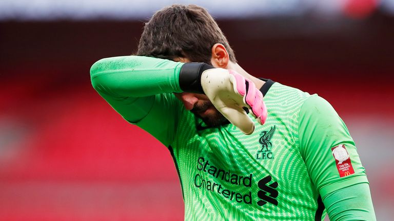Alisson was unable to get close to any of Arsenal's five converted penalties