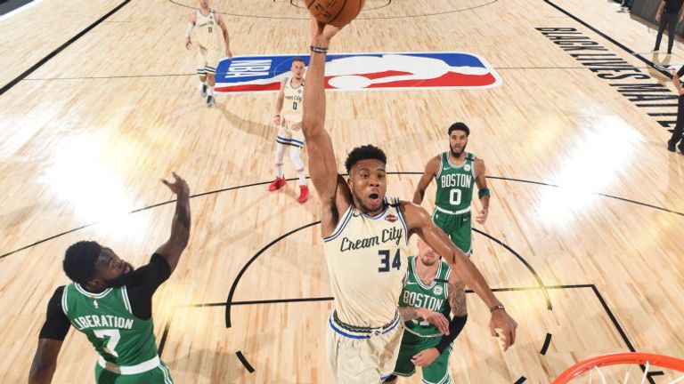 Giannis Antetokounmpo of the Milwaukee Bucks drives to the basket during the game against the Boston Celtics