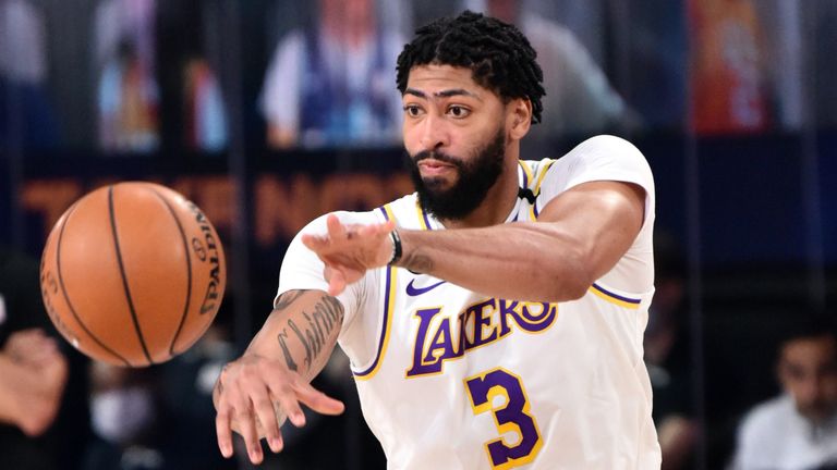Anthony Davis passes to a team-mate during the Lakers' win over the Jazz