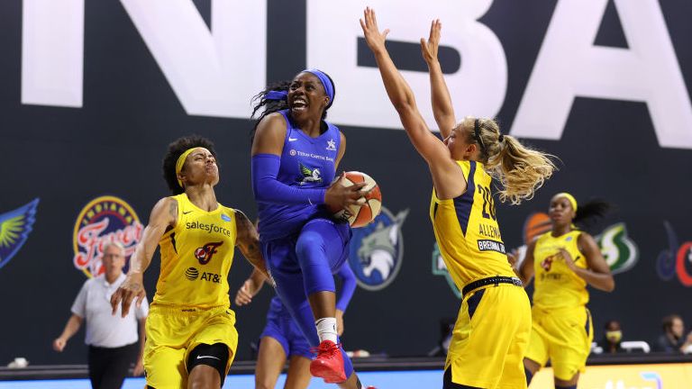 Arike Ogunbowale of the Dallas Wings shoots the ball against the Indiana Fever