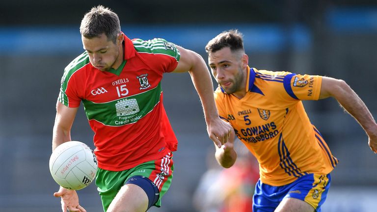 Dean Rock of Ballymun Kickhams evades Dean Ryan of Na Fianna
