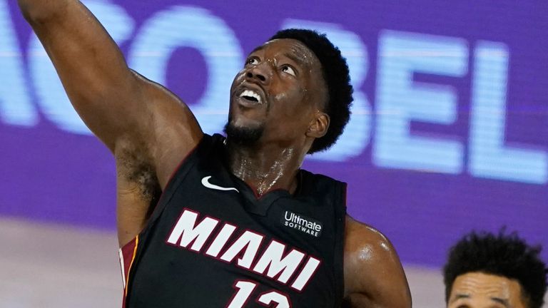 Bam Adebayo leaps for a rebound in the Heat's Game 4 win over the Pacers