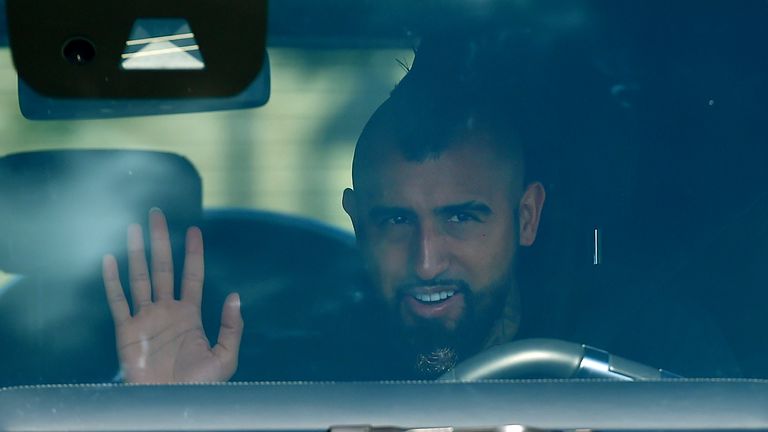 Barcelona's Chilean midfielder Arturo Vidal waves as he arrives at Barcelona's Ciutat Esportiva Joan Gamper in Sant Joan Despi to undergo a medical test for COVID-19, on August 30, 2020. - Lionel Messi was not seen attending Barcelona's training ground for coronavirus tests today morning, raising the possibility he will boycott pre-season to force his way out of the club