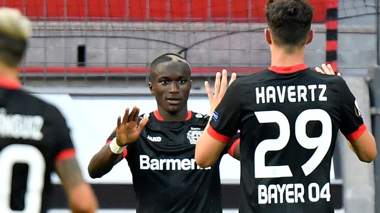 Moussa Diaby celebrates his goal to give Bayer Leverkusen the lead on the night