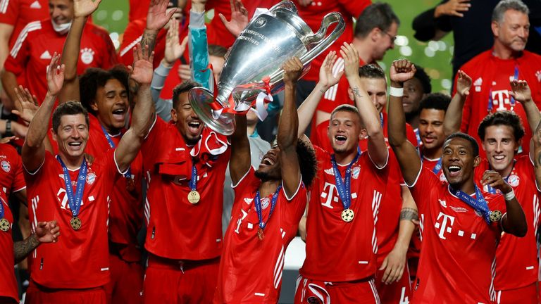 Match-winner Kingsley Coman lifts the Champions League trophy