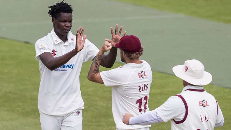 NORTHAMPTON, ENGLAND - AUGUST 16: Blessing Muzarabani of Northamptonshire (L) celebrates after taking the wicket of Dillon Pennington of Worcestershire during day two of the Bob Willis Trophy match between Northamptonshire and Worcestershire at The County Ground on August 16, 2020 in Northampton, England. (Photo by Andy Kearns/Getty Images)