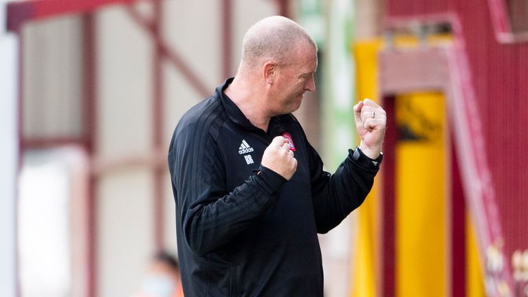 Hamilton boss Brian Rice shows his delight at the final whistle at Fir Park