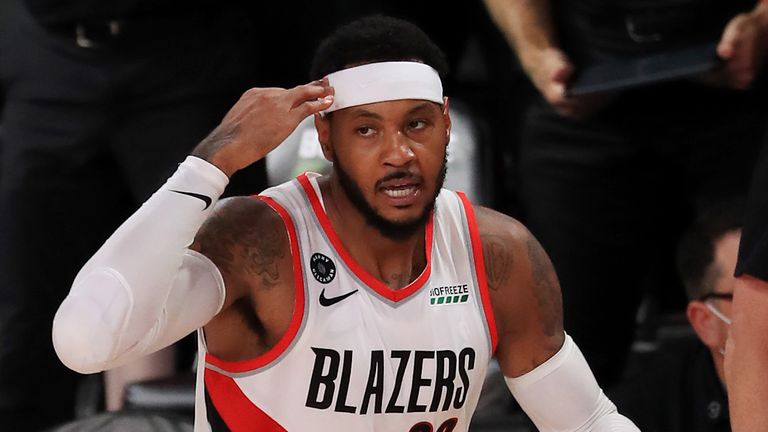 Carmelo Anthony celebrates a three-pointer in Portland's overtime win over Memphis