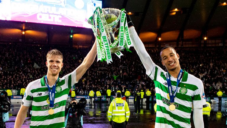 Celtic's Kristoffer Ajer (left) and Christopher Jullien pose with the Scottish League Cup trophy