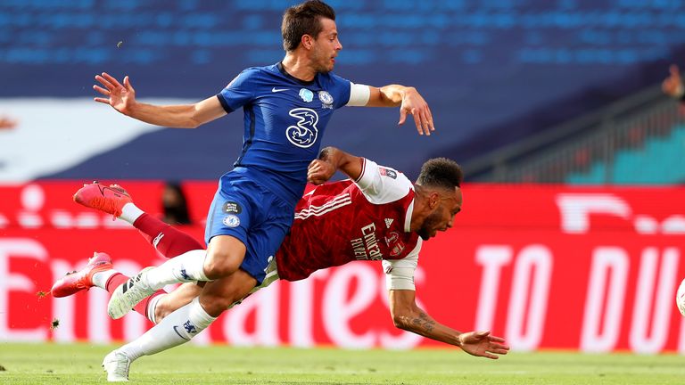 Cesar Azpilicueta fouls Pierre-Emerick Aubameyang for an Arsenal penalty in the FA Cup final