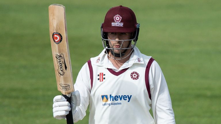 Charlie Thurston of Northamptonshire acknowledges the applause from his team mates on reaching his half-century during day four of the Bob Willis Trophy match between Northamptonshire and Glamorgan at The County Ground on August 25, 2020 in Northampton, England. (Photo by Andy Kearns/2020 Getty Images)