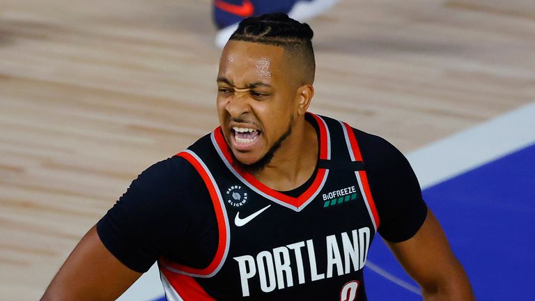 CJ McCollum celebrates a basket for Portland in their Play-In game against the Memphis Grizzlies