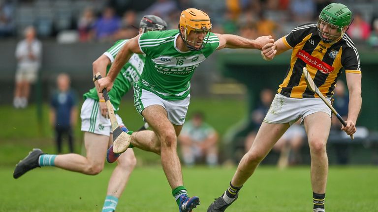 Colin Fennelly of Ballyhale Shamrocks in action against Des Dunne of Danesfort