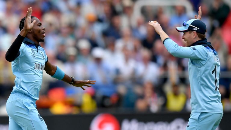 England ODI captain Eoin Morgan (R) celebrates a wicket with Jofra Archer