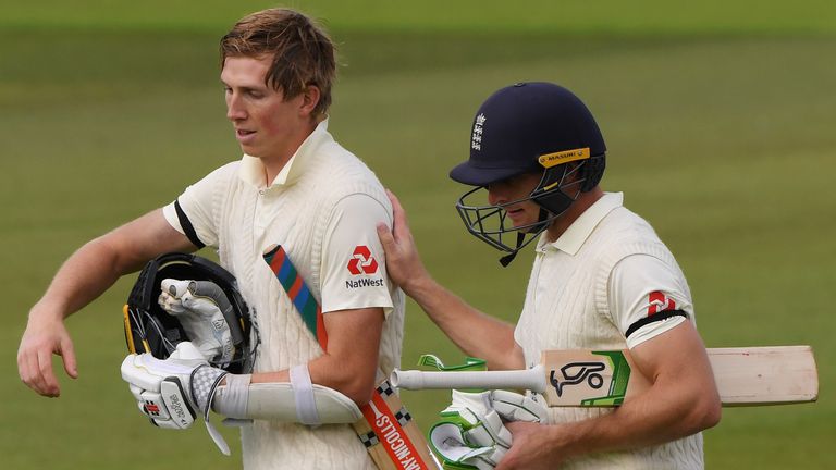 Zak Crawley (L) and Jos Buttler put together an unbroken stand of 205 on the first day of the third Test against Pakistan