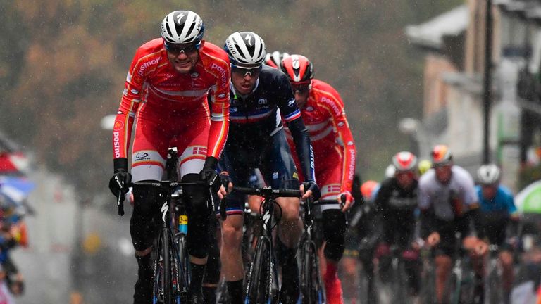Denmark's Kasper Asgreen leads a group up Parliament Hill in Harrogate, northern England, on September 29, 2019 as they compete in the Men's Elite Road Race at the 2019 UCI Road World Championships, Leeds to Harrogate.