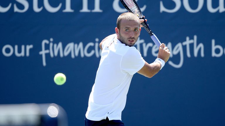 Dan Evans of Great Britain returns a shot to Milos Raonic of Canada during their Men's Singles Second Round match on day five of the Western & Southern Open at USTA Billie Jean King National Tennis Center on August 24, 2020 in the Queens borough of New York City