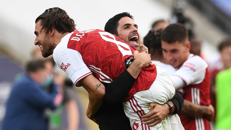 Dani Ceballos and Mikel Arteta celebrate winning the FA Cup