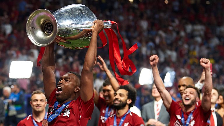 Daniel Sturridge lifts the Champions League trophy after Liverpool&#39;s win over Tottenham in 2019