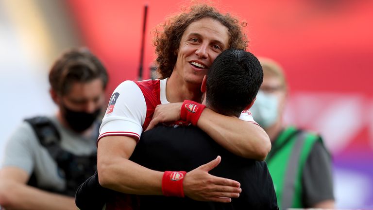 David Luiz celebrates with Mikel Arteta after Arsenal's FA cup win