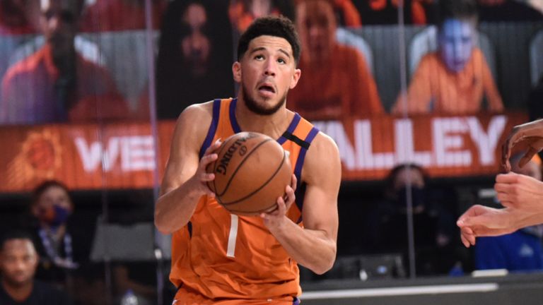 Devin Booker splits the Dallas defense