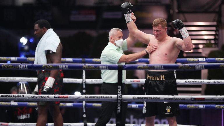 HANDOUT PICTURE COMPLIMENTS OF MATCHROOM BOXING.Dillian Whyte  vs Alexander Povetkin, WBC Diamond Belt Title fight..22 August 2020.Picture By Mark Robinson..Dillian Whyte looks dejected as Alexander Povetkin...s am is raised. 