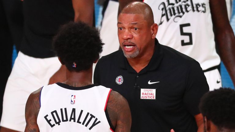 Clippers coach Doc Rivers gives instructions to Lou Williams