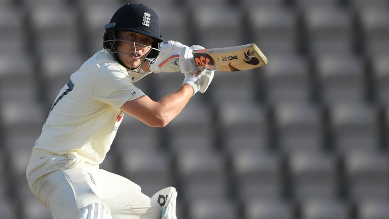 England's Dom Bess hits a shot on the second day of the third Test cricket match between England and Pakistan at the Ageas Bowl in Southampton, southern England on August 22, 2020. 