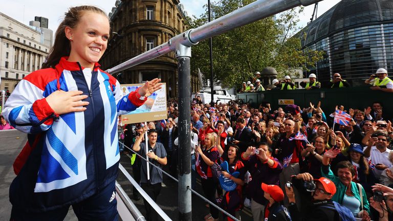 Swimming double gold and bronze medalist Ellie Simmonds waves to the crowd during the London 2012 Victory Parade for Team GB and Paralympic GB athletes on September 10, 2012 in London, England