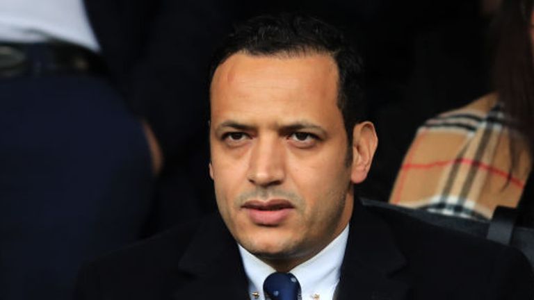 An arbitrator has ruled Oldham chairman Abdallah Lemsagam did not breach the terms of the manager's contract.