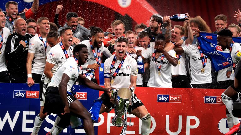 Fulham...s captain Tom Cairney lifts the trophy after they win the Sky Bet Championship Play Off Final at Wembley Stadium, London. PA Photo. Issue date: Tuesday August 4, 2020. See PA story SOCCER Championship. Photo credit should read: Mike Egerton/PA Wire...EDITORIAL USE ONLY No use with unauthorised audio, video, data, fixture lists, club/league logos or &#34;live&#34; services. Online in-match use limited to 120 images, no video emulation. No use in betting, games or single club/league/player publications.