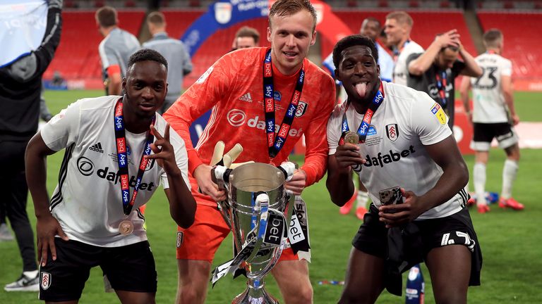 Fulham...s Neeskens Kebano, goalkeeper Marek Rodak and Aboubakar Kamara (left-right) celebrate with the trophy after winning the Sky Bet Championship Play Off Final at Wembley Stadium, London. PA Photo. Issue date: Tuesday August 4, 2020. See PA story SOCCER Championship. Photo credit should read: Mike Egerton/PA Wire...EDITORIAL USE ONLY No use with unauthorised audio, video, data, fixture lists, club/league logos or "live" services. Online in-match use limited to 120 images, no video emulation. No use in betting, games or single club/league/player publications.