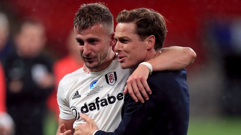 Fulham manager Scott Parker celebrates with goalscorer Joe Bryan after winning the Sky Bet Championship Play Off Final at Wembley Stadium, London. PA Photo. Issue date: Tuesday August 4, 2020. See PA story SOCCER Championship. Photo credit should read: Mike Egerton/PA Wire...EDITORIAL USE ONLY No use with unauthorised audio, video, data, fixture lists, club/league logos or "live" services. Online in-match use limited to 120 images, no video emulation. No use in betting, games or single club/league/player publications.