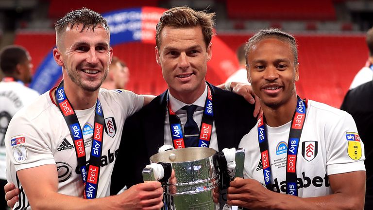 Fulham...s Joe Bryan (left), manager Scott Parker and Bobby Decordova-Reid celebrate with the trophy after winning the Sky Bet Championship Play Off Final at Wembley Stadium, London. PA Photo. Issue date: Tuesday August 4, 2020. See PA story SOCCER Championship. Photo credit should read: Mike Egerton/PA Wire...EDITORIAL USE ONLY No use with unauthorised audio, video, data, fixture lists, club/league logos or "live" services. Online in-match use limited to 120 images, no video emulation. No use in betting, games or single club/league/player publications.