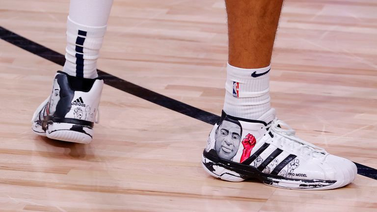Shoes with the images of George Floyd and Breonna Taylor worn by Jamal Murray of the Denver Nuggets against the Utah Jazz in Game Six of the Western Conference First Round 