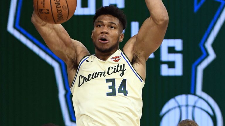 Giannis Antetokounmpo slams home a dunk en route to 36 points against Boston