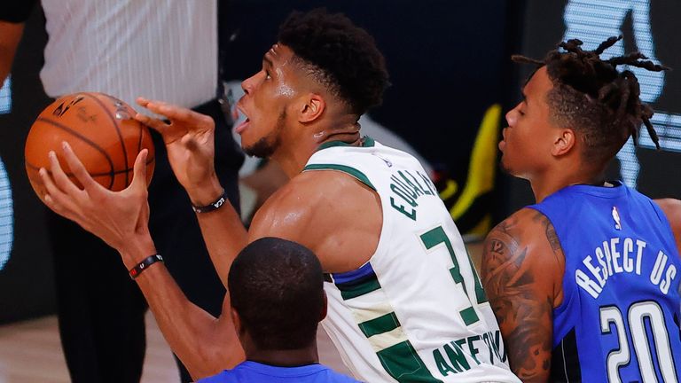 Giannis Antetokounmpo attacks inside against the Orlando Magic