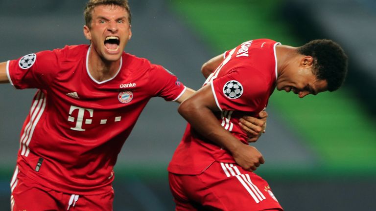 Serge Gnabry celebrates with Thomas Muller after scoring Bayern's second