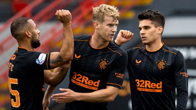 Ianis Hagi celebrates with team-mates after scoring to make it 1-0 to Rangers at Hamilton