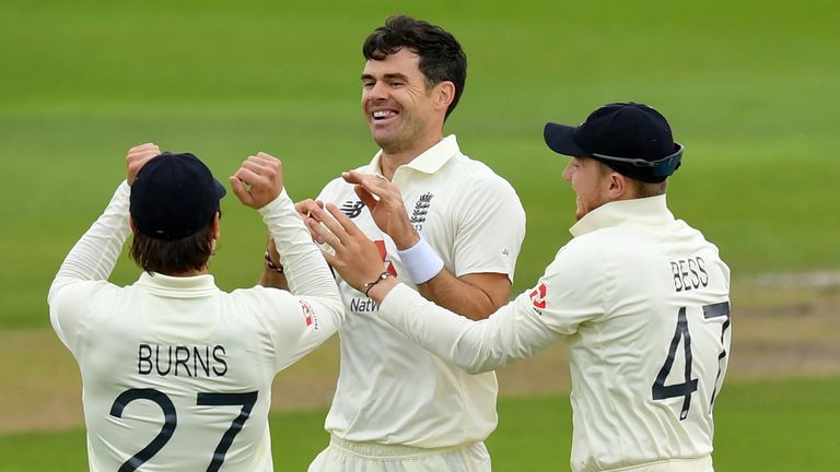 ngland's James Anderson (C) celebrates with teammates after taking the wicket of Pakistan's Babar Azam for 69 in the opening over on the second day of the first Test cricket match between England and Pakistan at Old Trafford in Manchester, north-west England on August 6, 2020.