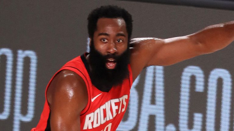 James Harden races up the court during the Rockets&#39; overtime win over the Mavericks