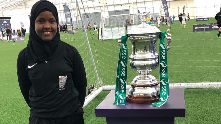 Roble pictured with the Women's FA Cup trophy (Credit: Jawahir Roble)