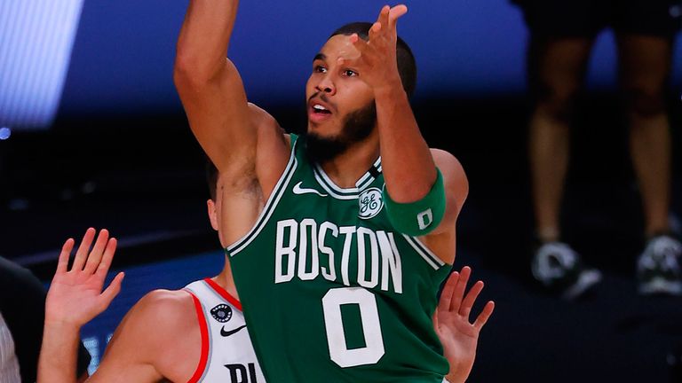 Jayson Tatum lofts a floater during Boston's win over Portland