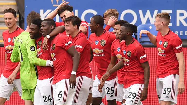 Jesse Lingard of Manchester United celebrates scoring his sides second goal during the Premier League match between Leicester City and Manchester United at The King Power Stadium on July 26, 2020 in Leicester, England.Football Stadiums around Europe remain empty due to the Coronavirus Pandemic as Government social distancing laws prohibit fans inside venues resulting in all fixtures being played behind closed doors.