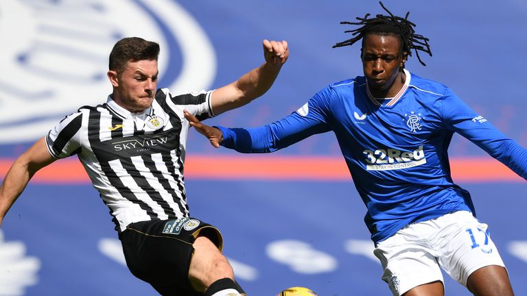 Nathan Sheron challenges Joe Aribo during the Scottish Premiership match