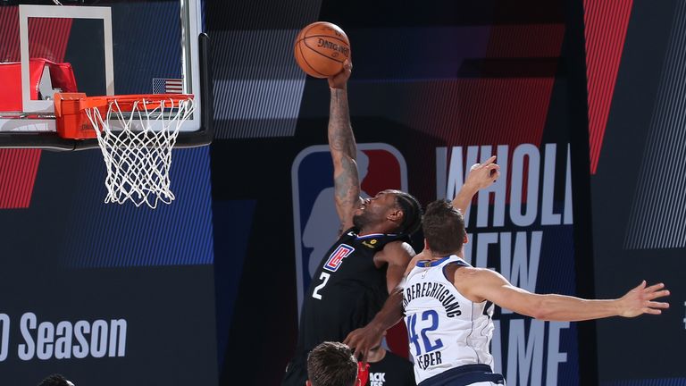 Kawhi Leonard of the LA Clippers dunks the ball against the Dallas Mavericks during Round One, Game Six of the NBA Playoffs