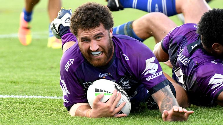 SUNSHINE COAST, AUSTRALIA - AUGUST 08: Kenny Bromwich of the Storm scores a try during the round 13 NRL match between the Melbourne Storm and the Canterbury Bulldogs at Sunshine Coast Stadium on August 08, 2020 in Sunshine Coast, Australia. (Photo by Bradley Kanaris/Getty Images)
