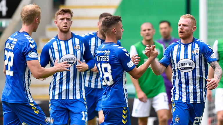 Kilmarnock's Chris Burke is congratulated by his team-mates after pulling a goal back against Hibernian