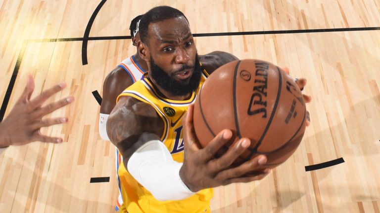 LeBron James drives to the basket in the Lakers' loss to the Thunder